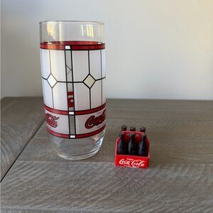 Coca-Cola Glass with Red and White Design & magnet. Good condition. $10.